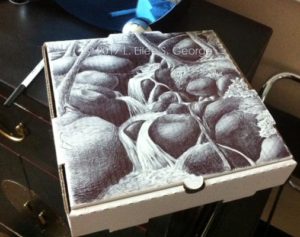 Ballpoint pen rendering of Rocky Mountain Waterfall in Idaho Springs CO done by L. Eilee S. George onto a pizza box in which we brought home leftovers from Beau Jo's Pizza