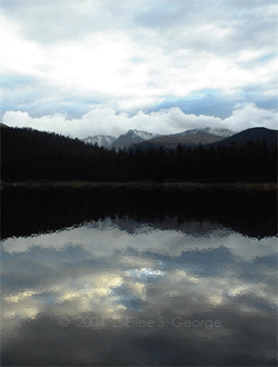Eilee George photo gallery sample gif of mountains with a mostly peaceful lake in motion in the foreground