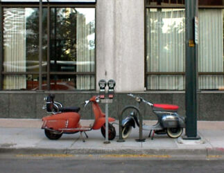 2 scooters photo © 2003 L. Eilee S. George with a scene of some Denver flavor, on a street near the 16th St Mall