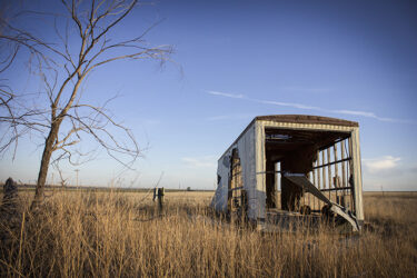 Old trailer in yard of abandoned house, ghost town Last Chance CO © 2022 L. Eilee S. George