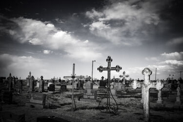Graveyard in Wilson KS with some very artistic metalwork © 2022 L. Eilee S. George