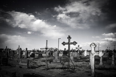 Graveyard in Wilson KS with some very artistic metalwork © 2022 L. Eilee S. George
