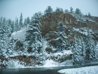 Shiny wet roads in a freak summer snowstorm on the continental divide © 2012 L. Eilee S. George