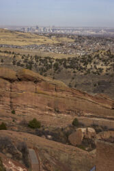 Zoomed into downtown Denver Colorado from Red Rocks Amphitheater about 10 miles west © 2022 L. Eilee S. George