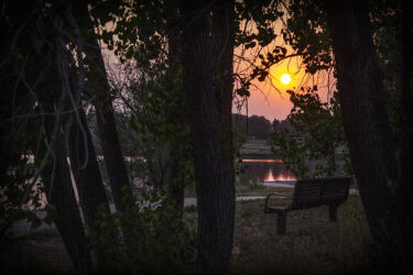 Sunset at the fairgrounds with a bench waiting for you © 2021 L. Eilee S. George