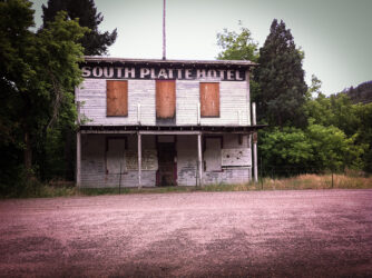 Decommissioned, delapidated, decaying old relic on S. Platte R. © 2014 L. Eilee S. George