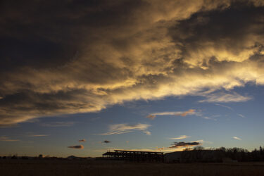 Sunset over a warehouse in construction Jefferson County CO © 2021 L. Eilee S. George