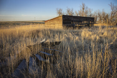 Abandoned farm outside Last Chance, CO (a ghost town) just before the lunar eclipse in May © 2022 L. Eilee S. George