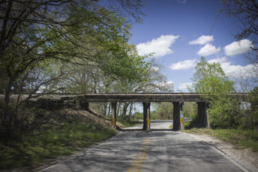 Old train trestle in Carterville MO © 2022 L. Eilee S. George