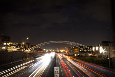 Long-exposure night shot Denver traffic on I-25 © 2022 L. Eilee S. George