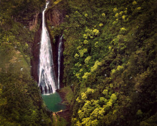 Manawaiopuna Falls used in movie Jurrassic Park on Kauai shot from helicopter in 35mm film © 1998 Linda Eilee S. George and faded print scanned and digitally color-corrected and enhanced by her 2021